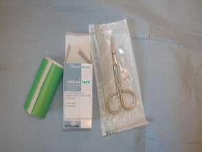 Haelan tape and surgical scissors