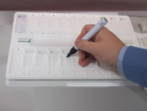 2.	A special pen is used to draw a perimeter to keep reagents within the slide