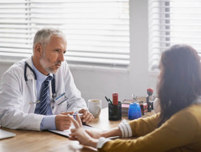 Patient consulting with a doctor
