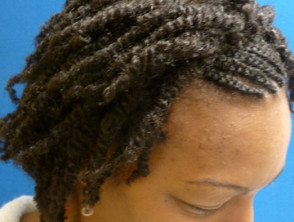 Natural hair twisted in woman of African descent
